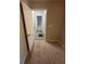 Bedroom doorway view down the carpeted hallway at 1457 Richland Sw Rd, Atlanta, GA 30310