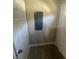 Hallway featuring a fuse box and a storage closet at 1457 Richland Sw Rd, Atlanta, GA 30310