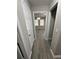 Hallway featuring vinyl flooring and view into the room at 1457 Richland Sw Rd, Atlanta, GA 30310