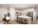 Bright, modern kitchen with stainless steel appliances, an island with seating, and ample counter space at 55 Alameda St # 6, Loganville, GA 30052