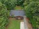 Aerial shot of a home with a large yard and mature tree coverage at 3510 Dunn Se St, Smyrna, GA 30080