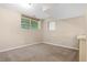 Finished basement area featuring carpet and a small window at 3510 Dunn Se St, Smyrna, GA 30080