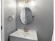 Upstairs bathroom with large mirror, and modern fixtures at 3510 Dunn Se St, Smyrna, GA 30080