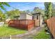 A well-maintained backyard features a deck and a side entrance at 961 Lindbergh Ne Dr, Atlanta, GA 30324