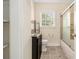 Well-lit bathroom with vanity, granite countertop, modern fixtures, and tub shower at 961 Lindbergh Ne Dr, Atlanta, GA 30324