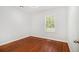 Bedroom with hardwood floors and a window letting in natural light at 961 Lindbergh Ne Dr, Atlanta, GA 30324