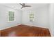 A bright bedroom with hardwood floors and two windows providing natural light at 961 Lindbergh Ne Dr, Atlanta, GA 30324