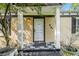 Close up of home's front entrance featuring white door, columns, and house number at 961 Lindbergh Ne Dr, Atlanta, GA 30324