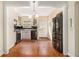 Bright kitchen features stainless steel appliances, white cabinets, and hardwood flooring at 961 Lindbergh Ne Dr, Atlanta, GA 30324