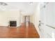 Spacious living room with fireplace, hardwood floors, and open layout at 961 Lindbergh Ne Dr, Atlanta, GA 30324
