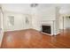 Spacious living room with hardwood floors, fireplace, and abundant natural light at 961 Lindbergh Ne Dr, Atlanta, GA 30324