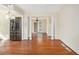 Open-concept living room with hardwood floors and large doorways at 961 Lindbergh Ne Dr, Atlanta, GA 30324