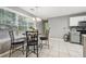 Eat-in kitchen area with lots of light from the adjacent window at 250 Kensington Trce, Stockbridge, GA 30281