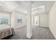This empty main bedroom features neutral decor, ceiling fan and a tray ceiling at 250 Kensington Trce, Stockbridge, GA 30281