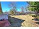 Spacious lawn and patio in a fenced backyard at 2500 Rosehill Cir, Lithia Springs, GA 30122