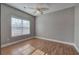 Bedroom with hardwood floors, fan and natural light at 2500 Rosehill Cir, Lithia Springs, GA 30122