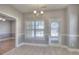 Eat-in dining area with a chandelier and backyard views at 2500 Rosehill Cir, Lithia Springs, GA 30122