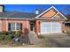 Brick home with a two-car garage at 2500 Rosehill Cir, Lithia Springs, GA 30122