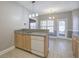 Open kitchen featuring updated appliances and a breakfast bar at 2500 Rosehill Cir, Lithia Springs, GA 30122