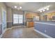 Eat-in kitchen with stainless steel appliances and light wood cabinetry at 2500 Rosehill Cir, Lithia Springs, GA 30122