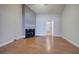 Bright living room with vaulted ceilings, fireplace, and wood-look floors at 2500 Rosehill Cir, Lithia Springs, GA 30122