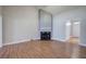 Bright living room with vaulted ceilings, fireplace, and wood-look floors at 2500 Rosehill Cir, Lithia Springs, GA 30122
