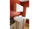 Bright laundry room with sink, cabinets, and a new washer and dryer at 2720 Stillwater Lake Ln, Marietta, GA 30066