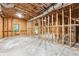 Unfinished basement providing a blank canvas for your creative ideas with exposed framing and concrete floor at 7650 Abbey Glen Dr, Cumming, GA 30028