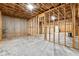 Unfinished basement featuring framed walls, concrete floors, and exposed ceiling ready to be transformed into a livable space at 7650 Abbey Glen Dr, Cumming, GA 30028