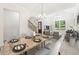 Elegant dining room featuring stylish decor, an archway and an inviting atmosphere for gatherings at 7650 Abbey Glen Dr, Cumming, GA 30028