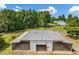 Aerial view of home and outbuilding, showing covered parking and workshop at 195 Connesena Rd, Kingston, GA 30145