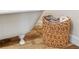 Charming bathroom featuring a classic clawfoot tub and a stylish woven basket filled with rolled towels at 195 Connesena Rd, Kingston, GA 30145