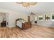 Inviting bedroom with hardwood floors, ceiling fan and access to the porch and living area at 195 Connesena Rd, Kingston, GA 30145