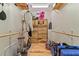 Walk-in closet with wooden shelving and hangers for organized storage and hardwood floors at 195 Connesena Rd, Kingston, GA 30145
