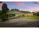 Charming home exterior with a covered parking area and inviting front porch at 195 Connesena Rd, Kingston, GA 30145