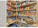 Large pantry providing generous storage space, with shelves fully stocked with food and household items at 195 Connesena Rd, Kingston, GA 30145