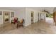 Spacious covered porch with ceiling fans and views of the landscaped yard at 195 Connesena Rd, Kingston, GA 30145