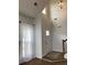 Bright foyer with high ceilings, hardwood floors, and natural light at 3040 Ivey Oaks Ln, Roswell, GA 30076
