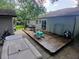 Spacious outdoor deck with seating and a serene backyard, great for entertaining or relaxing at 3356 Hollow Ct, Lawrenceville, GA 30044