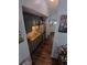 Efficient kitchen with sleek gray cabinets and modern stainless steel appliances at 3356 Hollow Ct, Lawrenceville, GA 30044