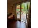 View from inside looking onto the wooden back deck and lush backyard at 3365 Ne Ivy Lake Drive Northeast Dr, Buford, GA 30519