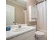 Clean bathroom featuring white fixtures and ample lighting, creating a welcoming space at 3365 Ne Ivy Lake Drive Northeast Dr, Buford, GA 30519