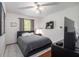 Stylish bedroom with a grey bed, modern decor, and plenty of natural light at 3365 Ne Ivy Lake Drive Northeast Dr, Buford, GA 30519