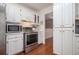 Bright kitchen featuring stainless steel appliances and ample cabinet space at 3365 Ne Ivy Lake Drive Northeast Dr, Buford, GA 30519