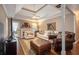 Spacious living room with a fireplace, hardwood floors, and comfortable seating arrangements at 3365 Ne Ivy Lake Drive Northeast Dr, Buford, GA 30519