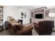 Cozy living room featuring stylish furnishings, a built-in entertainment center, and neutral decor at 3365 Ne Ivy Lake Drive Northeast Dr, Buford, GA 30519