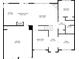 Detailed first floor plan showcasing the layout of the living room, kitchen, dining room, and garage at 3569 Tupelo Trl, Auburn, GA 30011