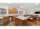 Cozy living room off the kitchen featuring a fireplace and comfortable seating at 3569 Tupelo Trl, Auburn, GA 30011