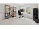 Well-lit office space with bookshelves, a desk, and a comfortable chair at 3569 Tupelo Trl, Auburn, GA 30011