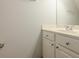 Well-lit bathroom with a sink vanity, mirror, and neutral color scheme at 5589 Trace Views Dr, Norcross, GA 30071